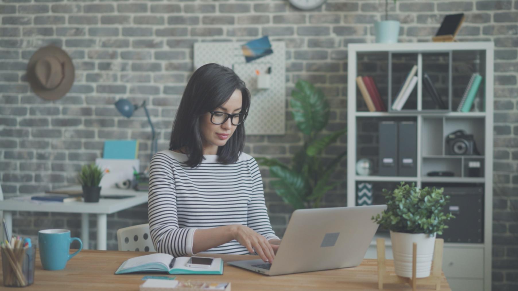 Students working on cloud server configurations in modern computer lab